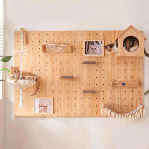 Pegboard cat wall basic set in natural pine wood with macramé hammock, clear acrylic cat bowl, sisal steps, wooden cat house, and track toy on a white wall