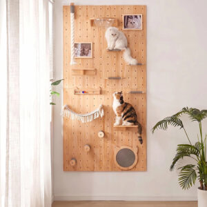 Pegboard cat wall ultimate set in natural pine wood with full vertical layout, sisal scratching post, acrylic bowl, cat-head scratching pad, track toy, multiple platforms, and hammocks near a window